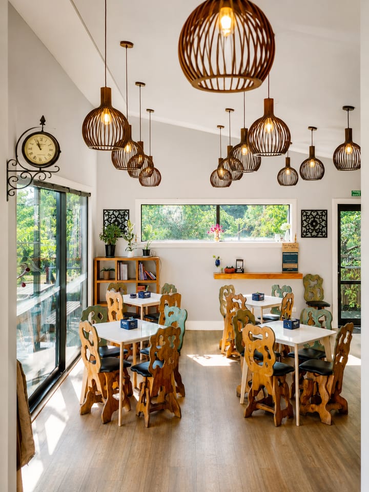 The light-filled dining room inside Gatehouse Cafe