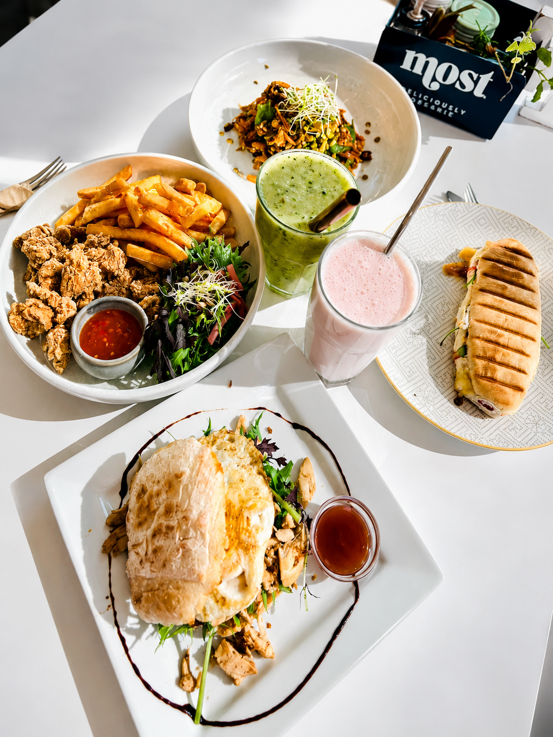 A selection of cafe lunch plates and drinks at Gatehouse Cafe