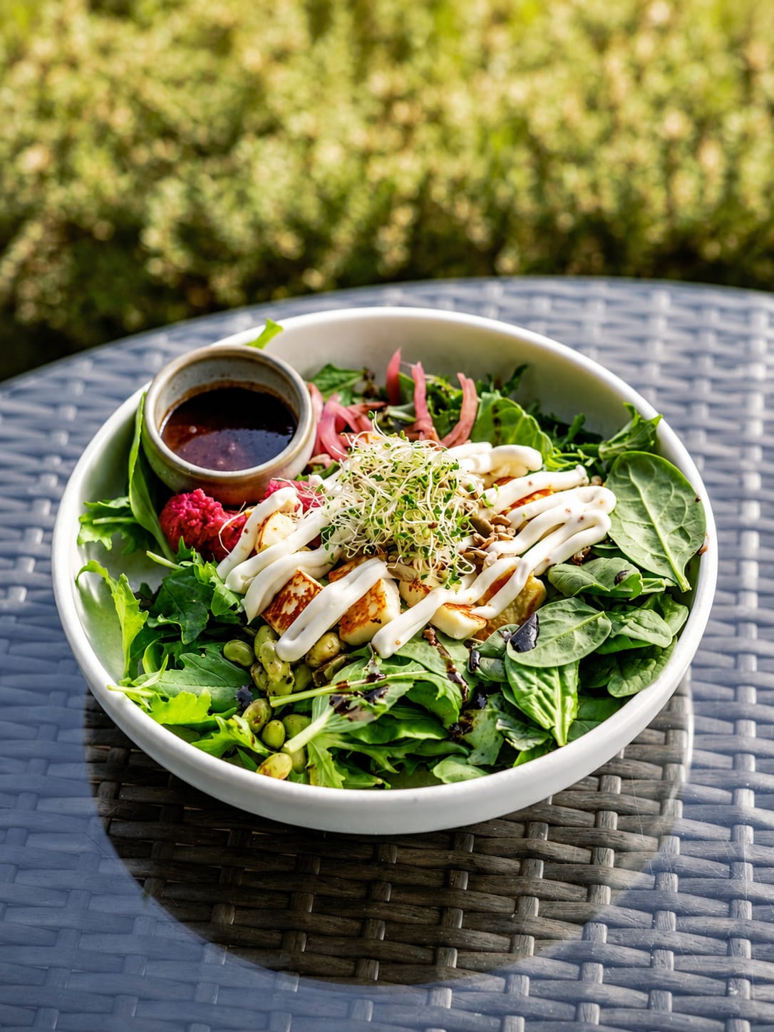 A fresh salad bowl served outdoors at Gatehouse Cafe